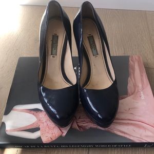 Navy patent Prada pumps
